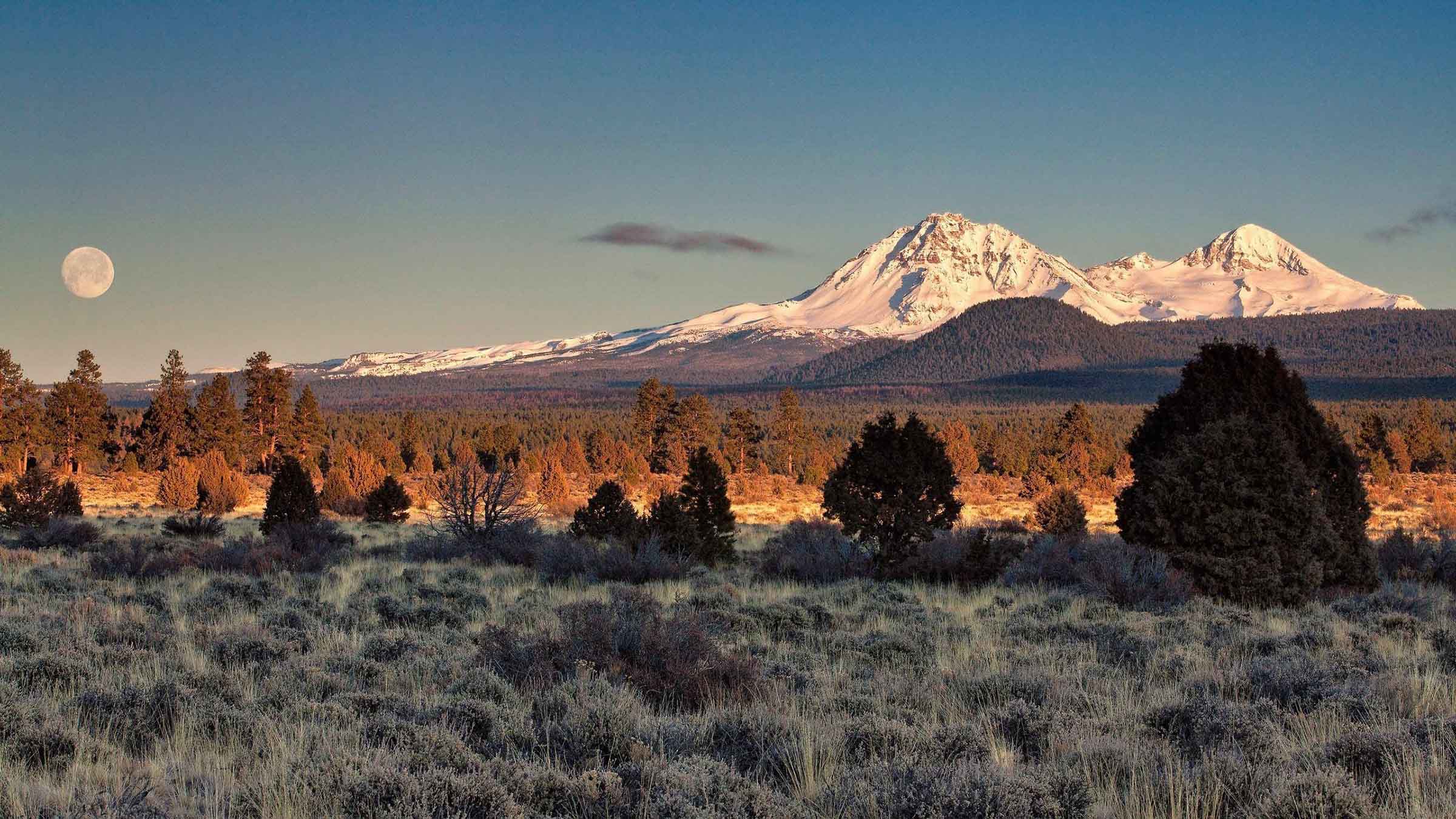 Central Oregon mountains with a full moon