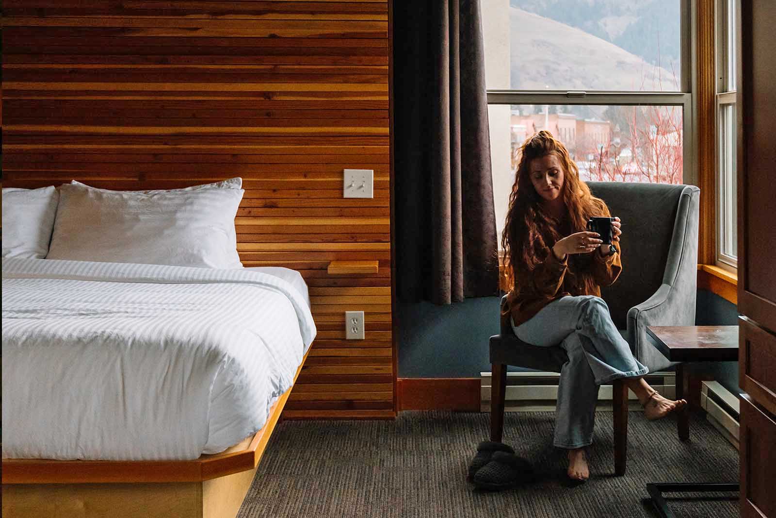 Woman in White Salmon hotel room